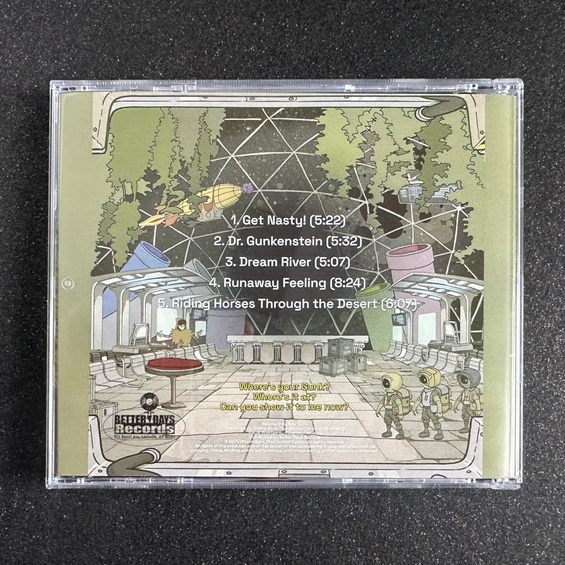 CD case with album art and tracklist on a black background